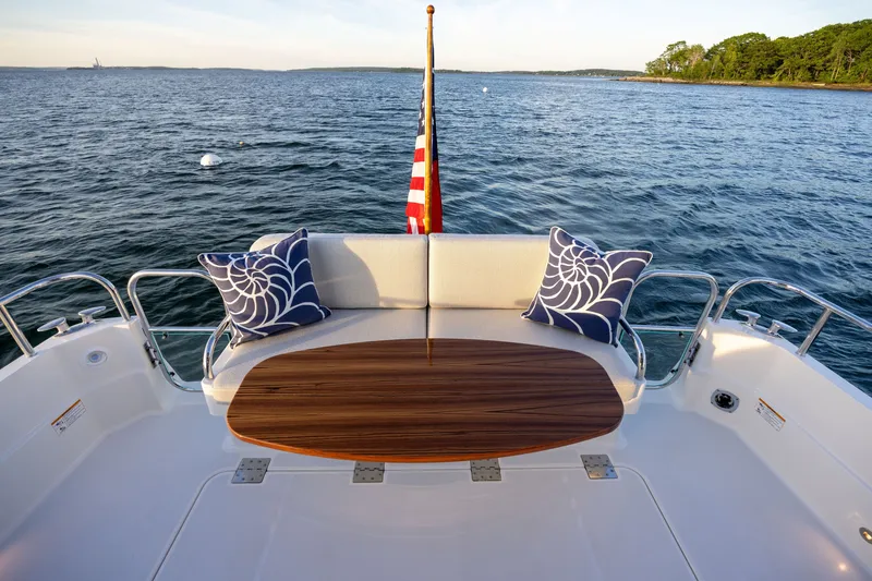 Slide: The Image of Aft deck of 2027 Sabre 38 Salon Express with elegant seating and ocean view. - 5