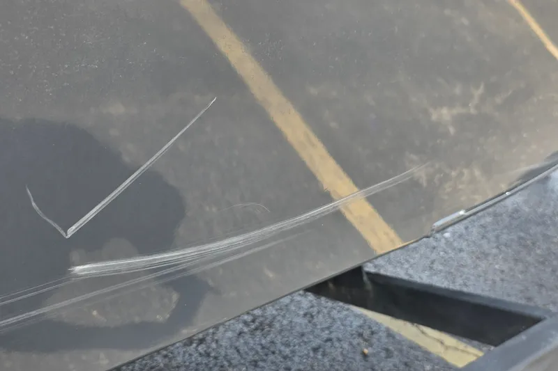 Slide: The Image of Scratches on 2021 Ranger VS1882 WT boat surface, close-up view. - 34