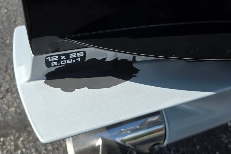 Slide: The Image of Close-up of a 2021 Ranger VS1882 WT boat propeller with specifications label. - 30