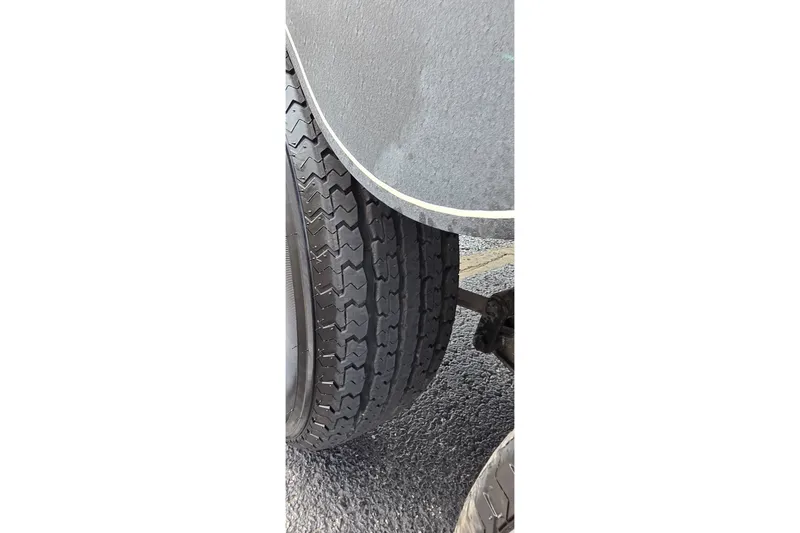 Slide: The Image of Close-up of a 2021 Ranger VS1882 WT trailer tire on asphalt. - 39