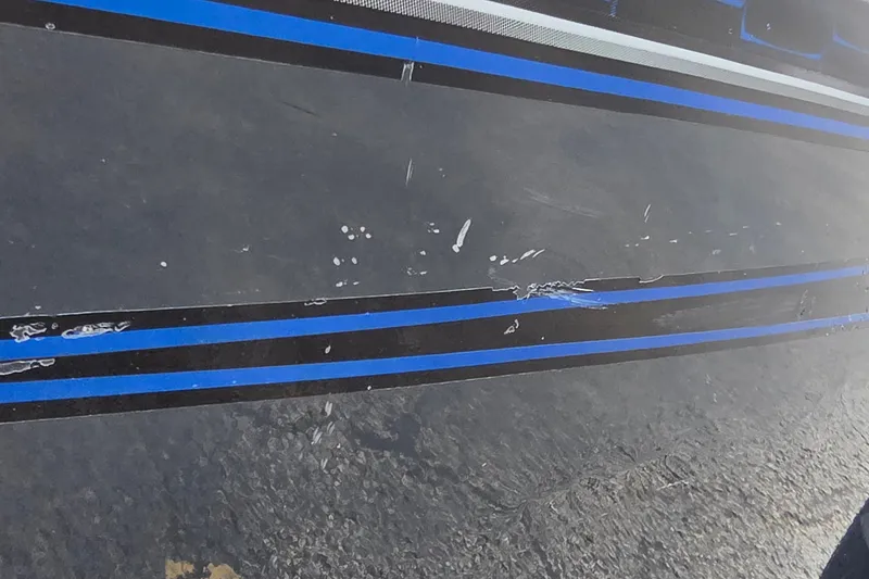 Slide: The Image of 2021 Ranger VS1882 WT boat with blue and black stripe detailing. - 25