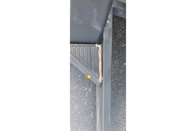 Slide: The Image of Close-up of a 2021 Ranger VS1882 WT boat's textured surface and corner detail. - 25