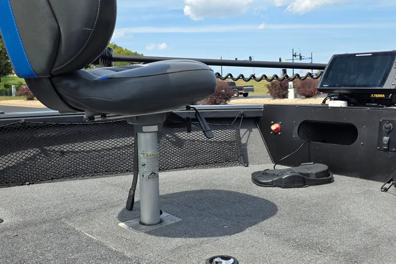 Slide: The Image of 2021 Ranger VS1882 WT boat interior with seat and control panel. - 13