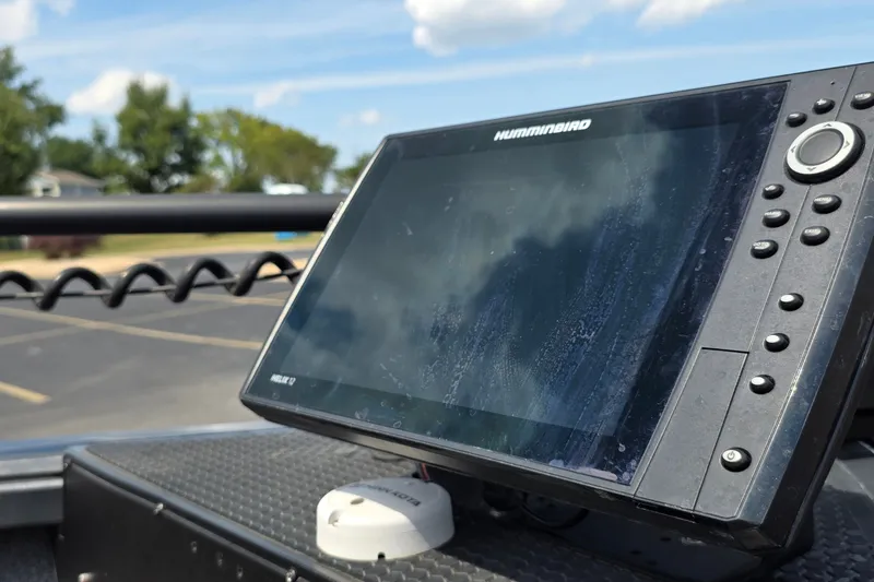 Slide: The Image of Fishfinder display on a 2021 Ranger VS1882 WT boat under a clear sky. - 11