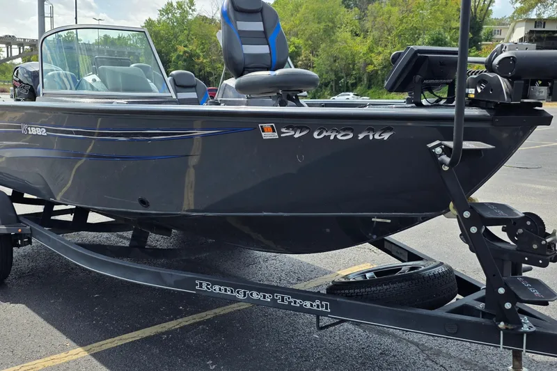 Slide: The Image of 2021 Ranger VS1882 WT boat on trailer, parked outdoors. - 3