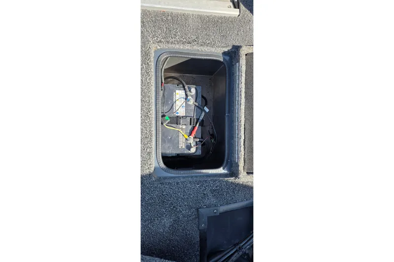 Slide: The Image of Battery compartment of 2021 Ranger VS1882 WT boat, showing wiring and connections. - 40