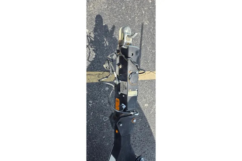 Slide: The Image of Trailer hitch of a 2021 Ranger VS1882 WT on asphalt surface. - 26