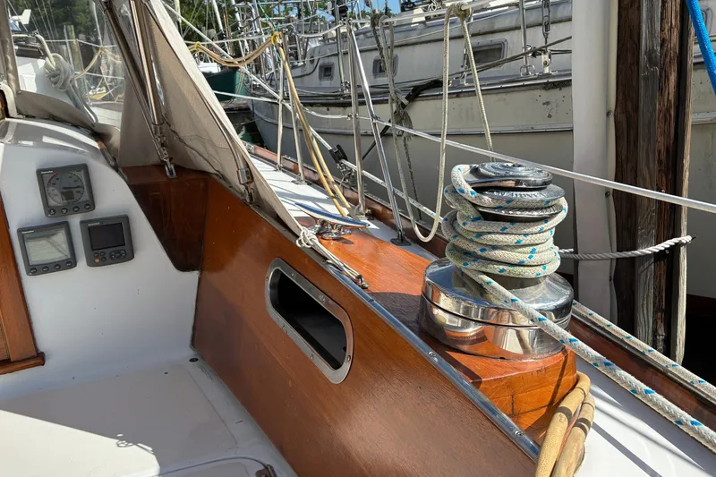 Slide: The Image of Hinckley Bermuda 40 MKIII sailboat deck with winch and ropes, 1966 model. - 16