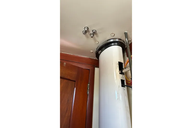 Slide: The Image of Interior view of 1966 Hinckley Bermuda 40 MKIII sailboat mast and ceiling. - 37