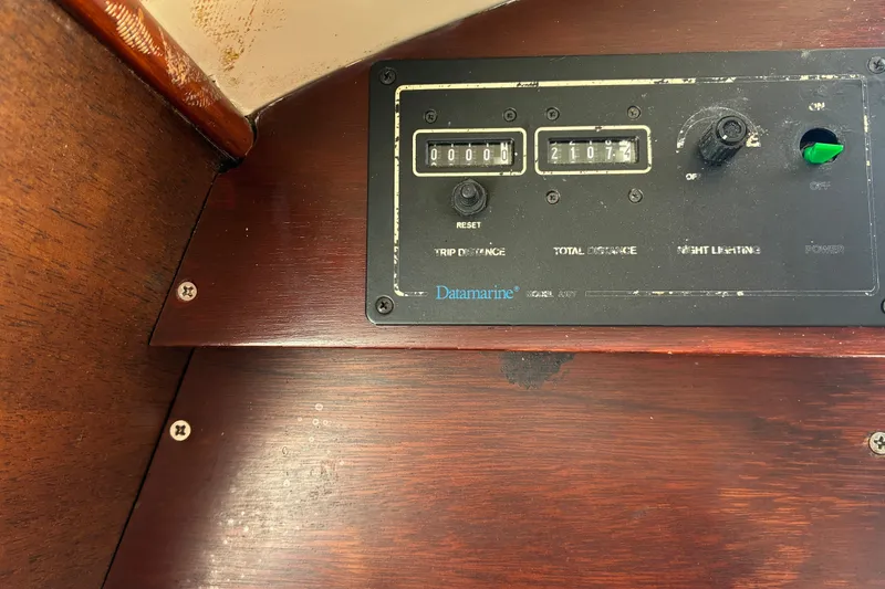 Slide: The Image of Instrument panel on 1966 Hinckley Bermuda 40 MKIII sailboat, showing trip and total distance. - 56