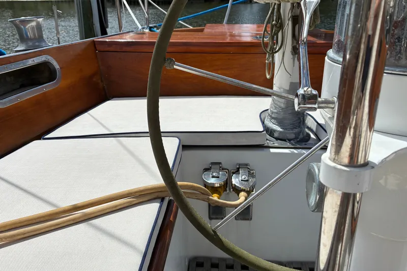 Slide: The Image of Cockpit of 1966 Hinckley Bermuda 40 MKIII sailboat with wooden and metal details. - 64