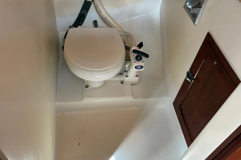 Slide: The Image of Compact marine toilet in 1966 Hinckley Bermuda 40 MKIII sailboat bathroom. - 45
