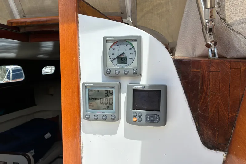 Slide: The Image of Hinckley Bermuda 40 MKIII 1966 sailboat cockpit with Raymarine navigation instruments. - 60