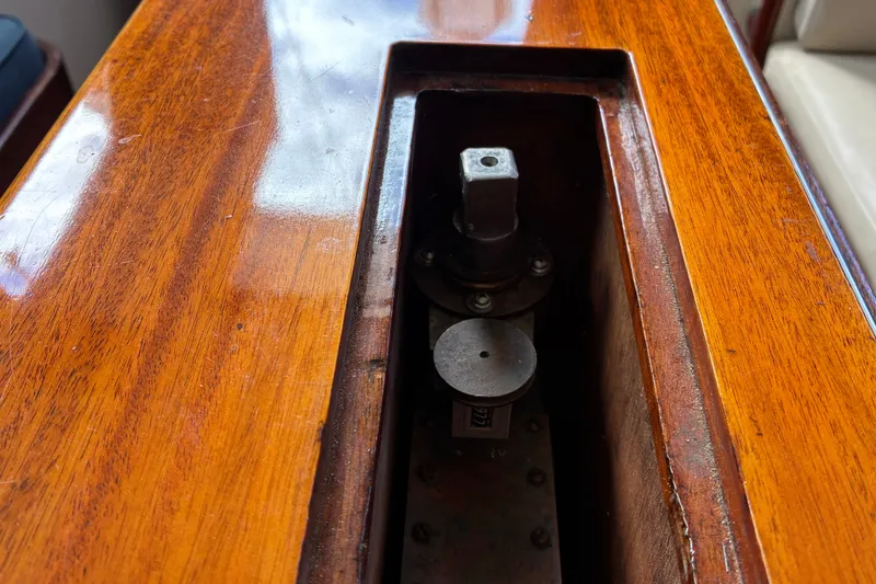 Slide: The Image of Wooden deck detail of a 1966 Hinckley Bermuda 40 MKIII sailboat. - 54