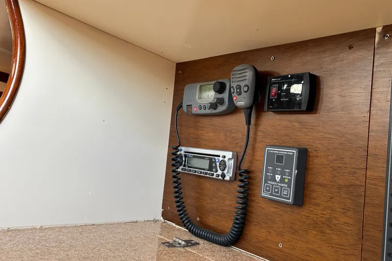 Slide: The Image of Hinckley Bermuda 40 MKIII 1966 yacht communication panel with radio and control systems. - 25