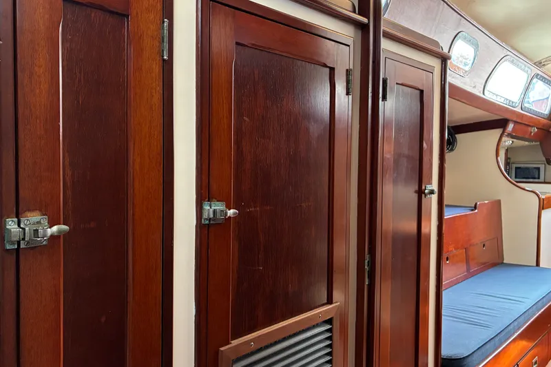 Slide: The Image of Interior of 1966 Hinckley Bermuda 40 MKIII sailboat with wooden cabinetry and seating. - 44