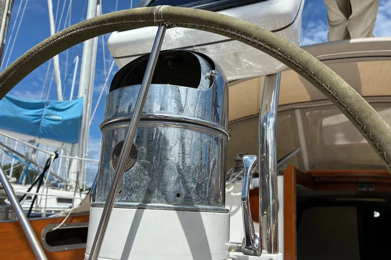 Slide: The Image of Close-up of the helm on a 1966 Hinckley Bermuda 40 MKIII sailboat. - 70
