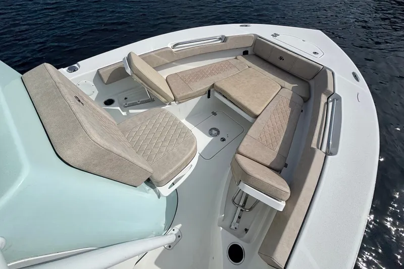 Slide: The Image of 2024 Sea Pro 202 Center Console boat with spacious seating and elegant design on the water. - 15