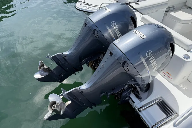 Slide: The Image of Twin Yamaha 200 outboard engines on 2023 Edgewater 262CX Crossover boat. - 23