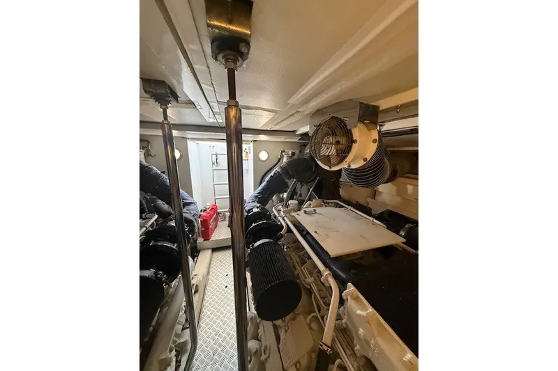 Slide: The Image of Engine room of 2007 Princess 67 Flybridge Motor Yacht, showcasing mechanical components. - 36