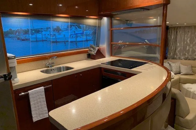 Slide: The Image of Luxurious kitchen interior of 2007 Princess 67 Flybridge Motor Yacht with modern amenities. - 28