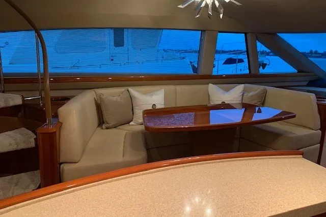 Slide: The Image of Luxurious interior of 2007 Princess 67 Flybridge Motor Yacht with elegant seating and table. - 29