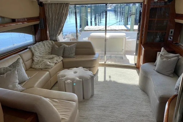 Slide: The Image of Luxurious interior of 2007 Princess 67 Flybridge Motor Yacht with plush seating and elegant decor. - 23