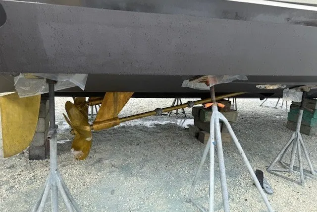 Slide: The Image of Bottom view of a 2007 Princess 67 Flybridge Motor Yacht with visible propeller and supports. - 47