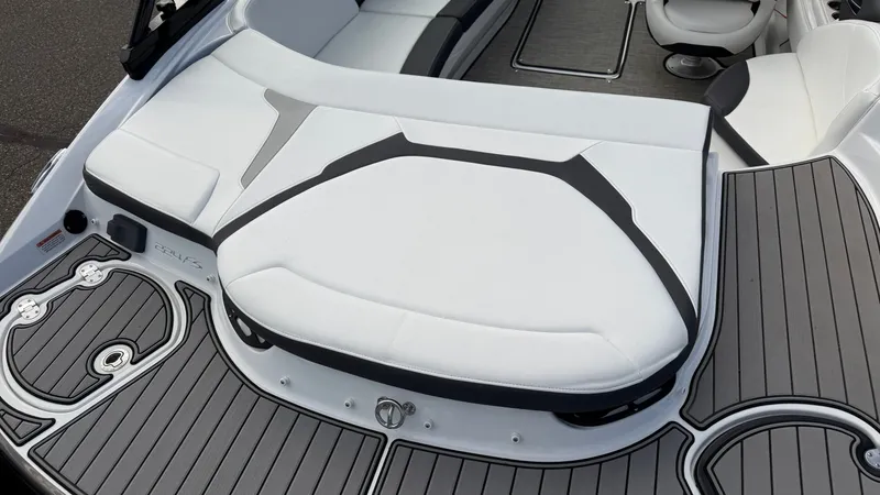 Slide: The Image of The image shows the stern of a Monterey 224FS boat with gray and white upholstery. - 17
