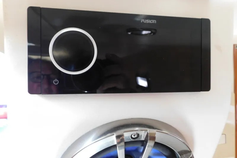 Slide: The Image of Fusion stereo system on 2004 Mainship Pilot 30 Rum Runner boat interior. - 35