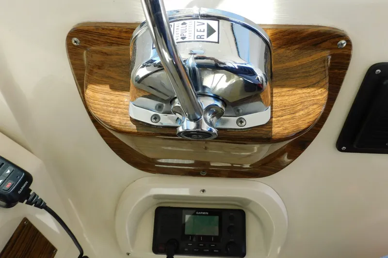 Slide: The Image of Control panel of a 2004 Mainship Pilot 30 Rum Runner boat with Garmin device. - 20
