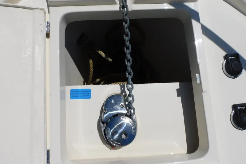 Slide: The Image of Anchor chain compartment on 2004 Mainship Pilot 30 Rum Runner boat. - 14