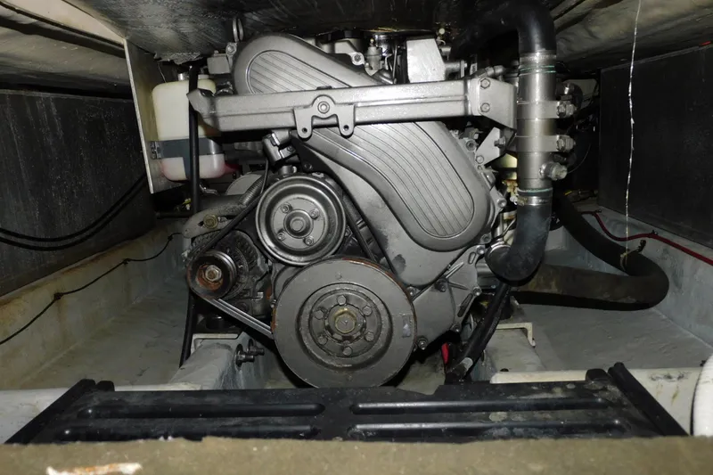 Slide: The Image of Engine compartment of a 2004 Mainship Pilot 30 Rum Runner boat. - 37