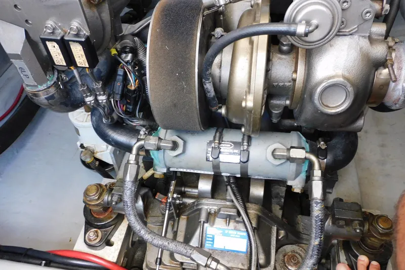 Slide: The Image of Engine components of a 2004 Mainship Pilot 30 Rum Runner boat. - 42