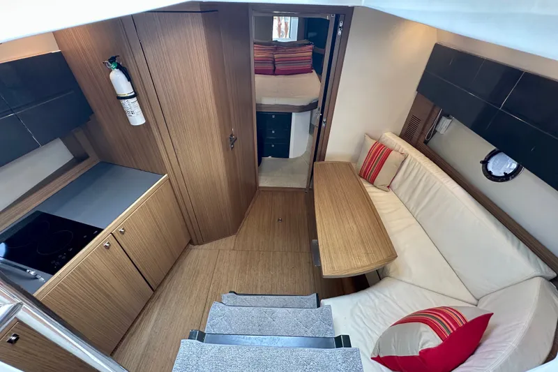 Slide: The Image of Luxurious interior of 2015 Azimut Atlantis 38 yacht with cozy seating and modern kitchen. - 14