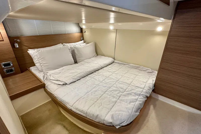 Slide: The Image of Luxurious cabin interior of 2015 Azimut Atlantis 38 yacht with cozy bedding. - 18