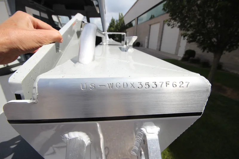 Slide: The Image of Close-up of a 2027 Weldcraft 240 Ocean King boat hull identification number. - 38