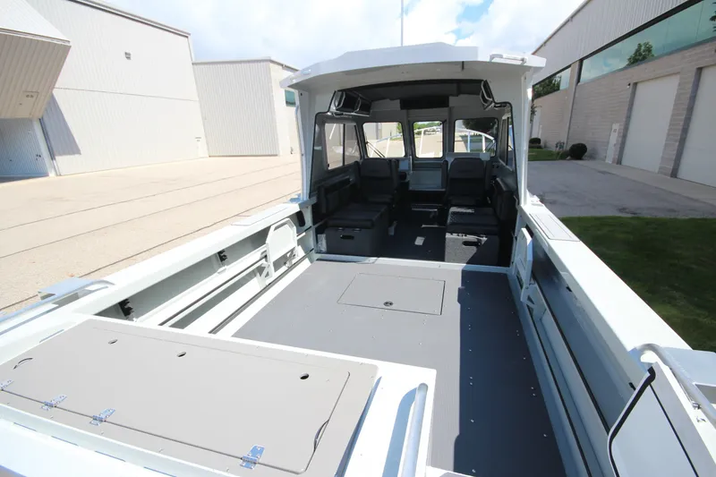 Slide: The Image of 2027 Weldcraft 240 Ocean King boat interior, spacious seating, and modern design. - 12