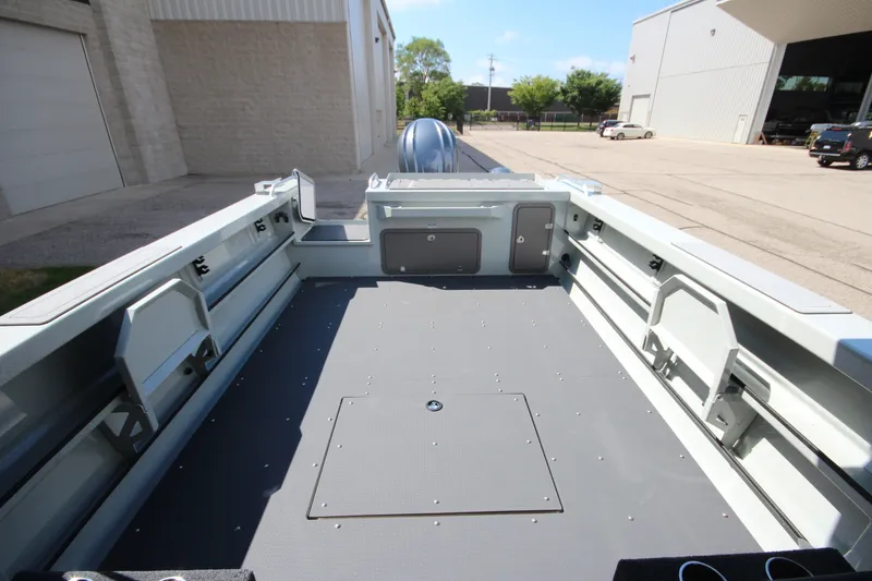Slide: The Image of 2027 Weldcraft 240 Ocean King boat interior, spacious deck, modern design. - 13