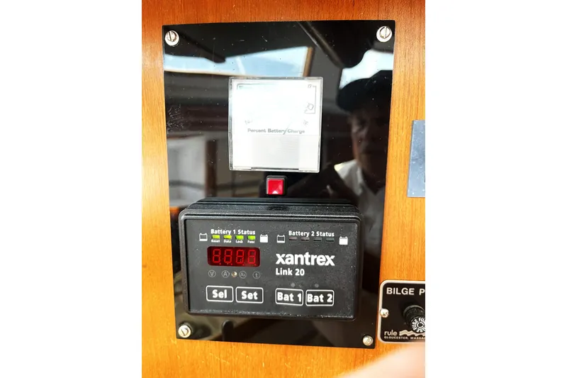 Slide: The Image of Control panel of a 1987 Macintosh Center Cockpit with Xantrex Link 20 battery monitor. - 30