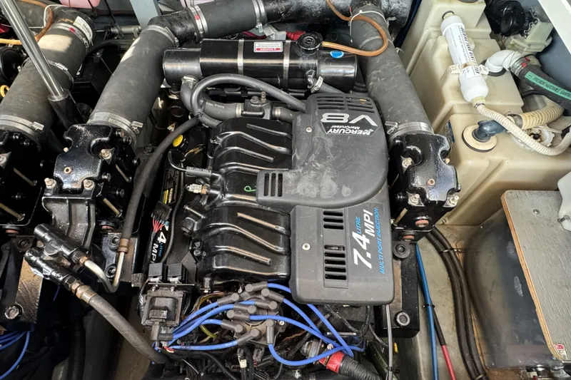 Slide: The Image of Engine compartment of a 2000 Sea Ray 340 Sundancer with MerCruiser 7.4L V8 engine. - 26
