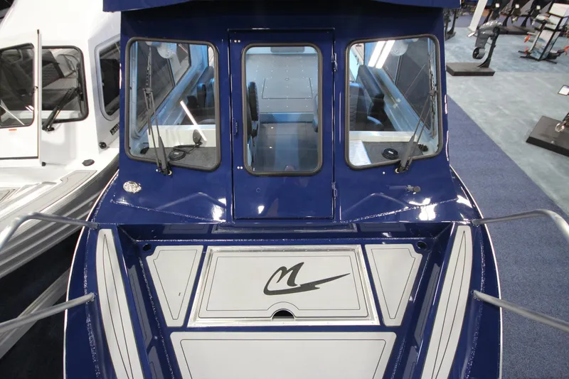 Slide: The Image of Barco Weldcraft 260 Ocean King 2026, cabina azul, vista interior. - 27