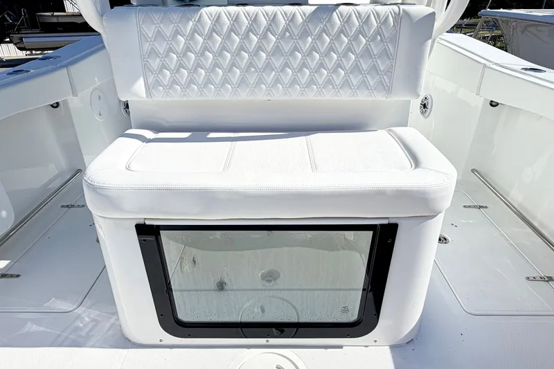 Slide: The Image of 2027 Sea Hunt Ultra 285SL boat seat with diamond-stitched upholstery and storage compartment. - 10