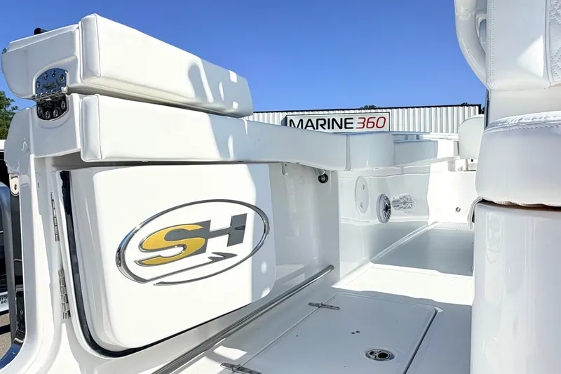 Slide: The Image of 2027 Sea Hunt Ultra 285SL boat interior with logo, showcased at Marine 360 dealership. - 5