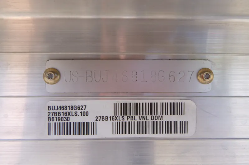 Slide: The Image of 2027 Sun Tracker Bass Buggy 16 XL Select identification plate with serial and barcode details. - 15