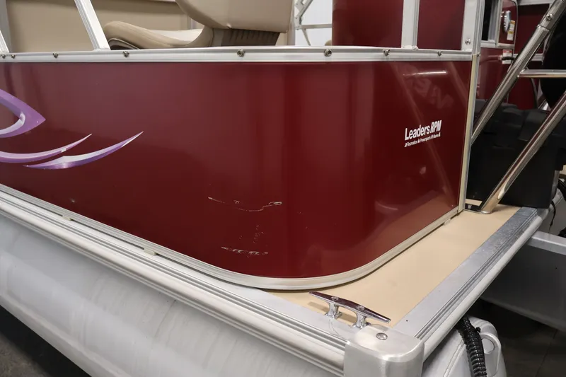 Slide: The Image of 2011 Sylvan Mirage 8520 pontoon boat with maroon exterior and seating area. - 43