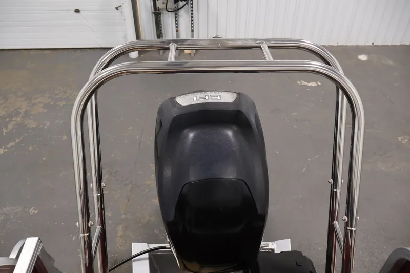 Slide: The Image of Outboard motor on a 2011 Sylvan Mirage 8520 boat, viewed from above. - 36