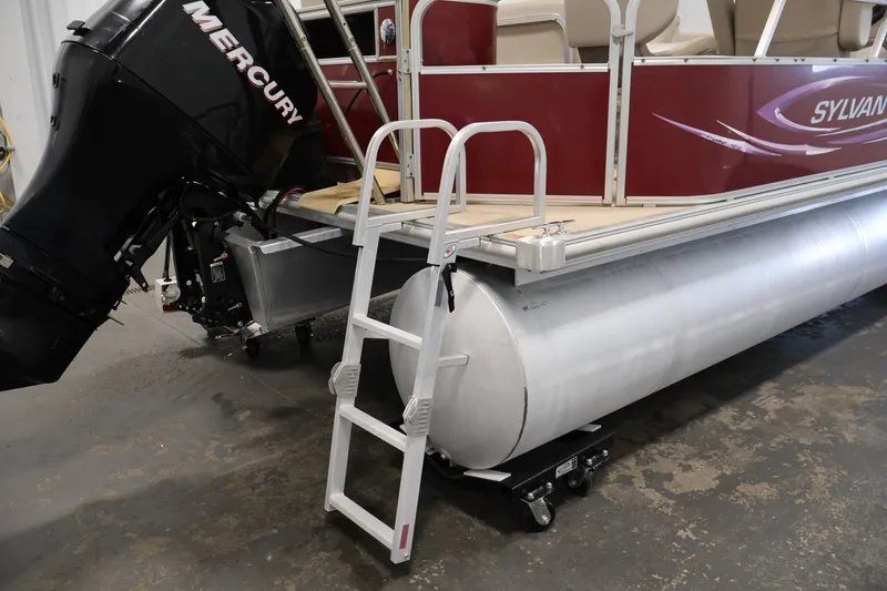 Slide: The Image of 2011 Sylvan Mirage 8520 pontoon boat with Mercury outboard motor and boarding ladder. - 37