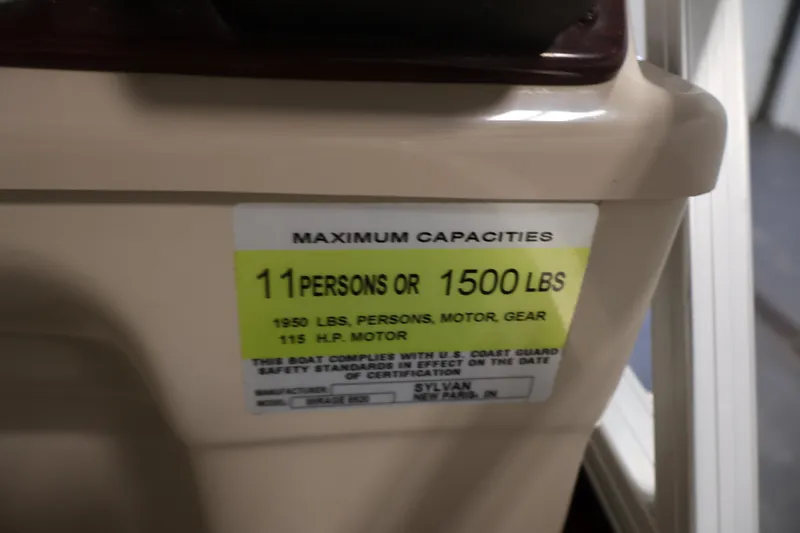 Slide: The Image of Capacity label on 2011 Sylvan Mirage 8520 boat: 11 persons or 1500 lbs. - 28