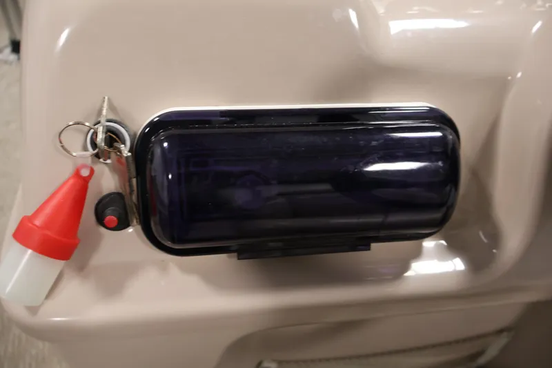 Slide: The Image of Key ignition and control panel on 2011 Sylvan Mirage 8520 boat. - 25
